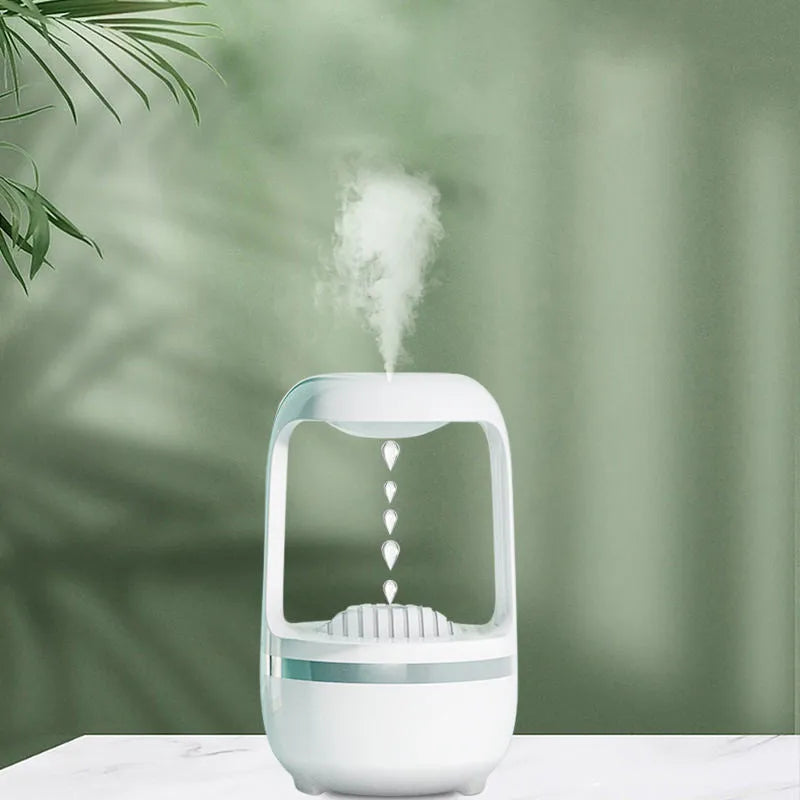 White anti-gravity water droplet humidifier with 500ml tank on a desk.