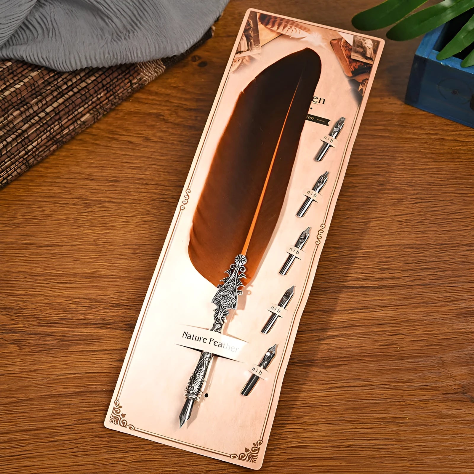 Vintage feather dip pen with zinc alloy shell in various colour options on a desk.