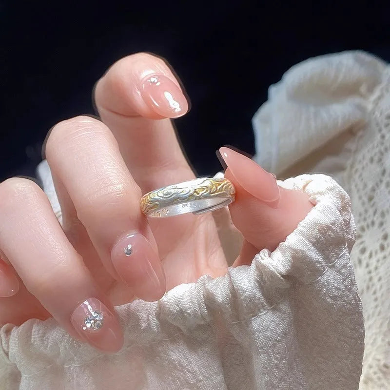 White copper open-mouth ring with geometric shape and Xiangyun pattern featuring electroplated silver gold finish