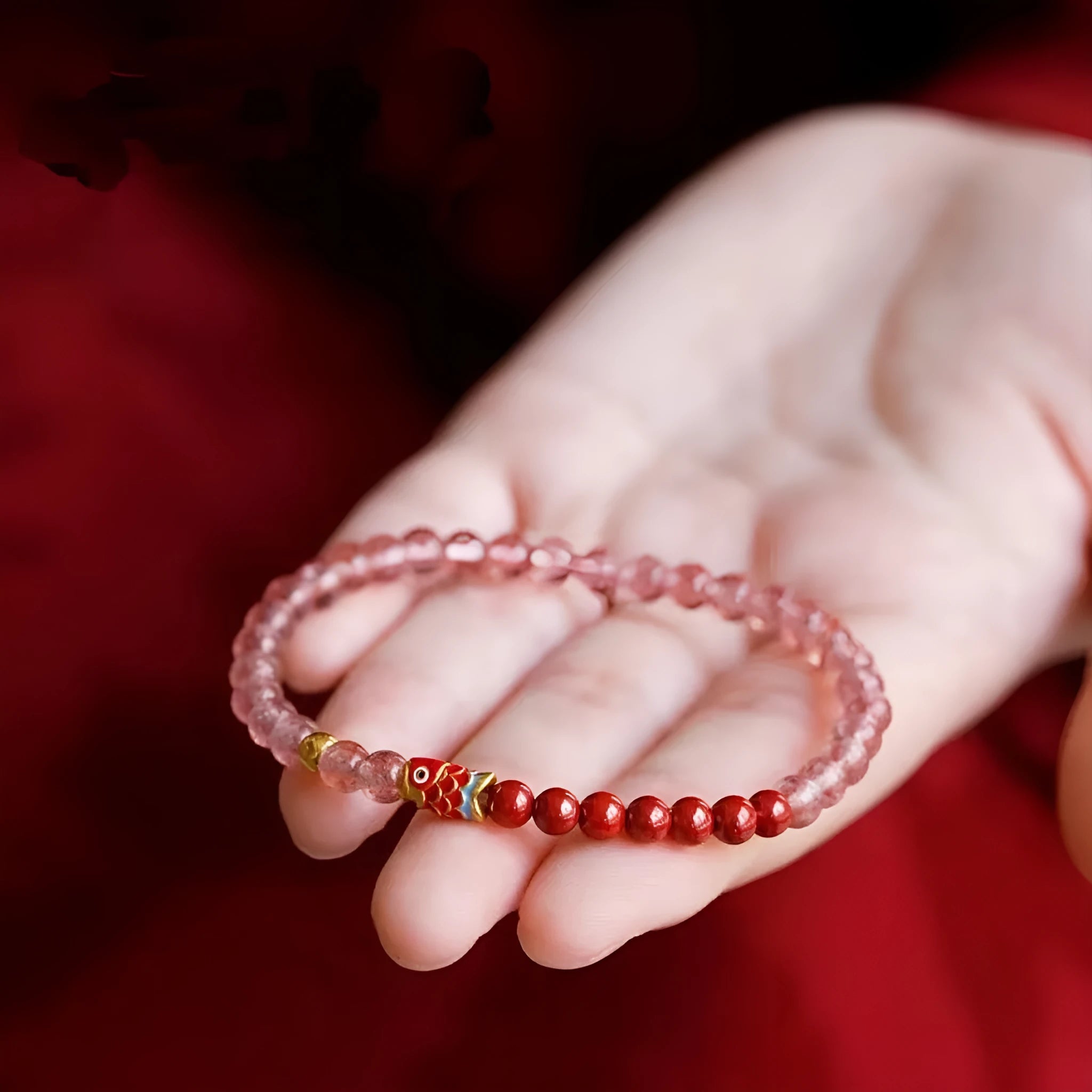 Purple cinnabar bracelet with strawberry quartz beads and peach blossom charm