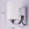Minimalist chrome wall lamp with a glass shade shown in single head and double head configurations