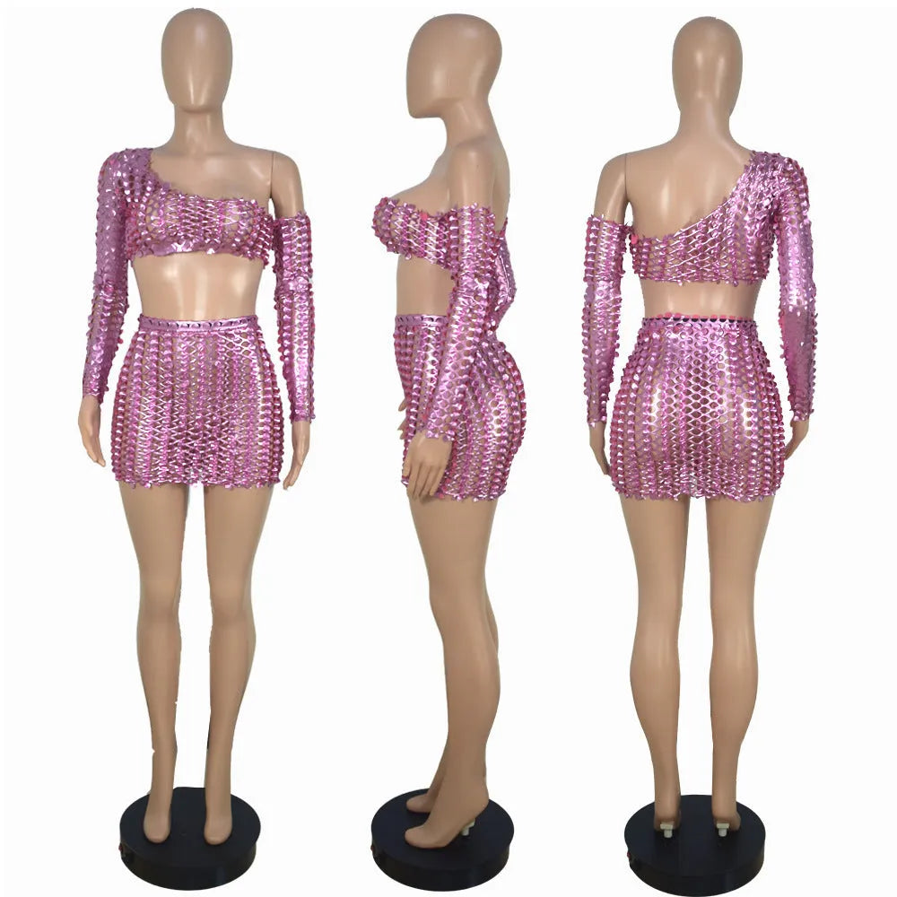 Women's black hollow out net sleeveless top and skirt two-piece dress set on a hanger.