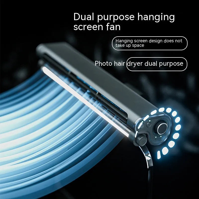 Black bladeless USB desk fan with an integrated lamp, shown clipped to the top of a laptop screen.
