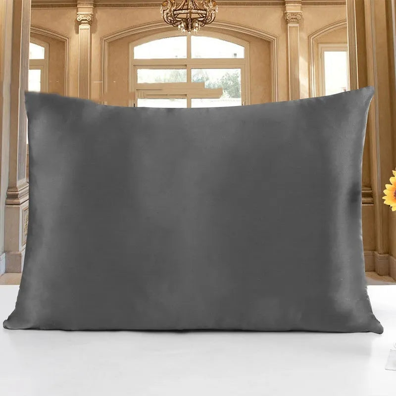 19 M double-sided silk pillowcase in apricot colour, showing envelope closure and smooth fabric texture.