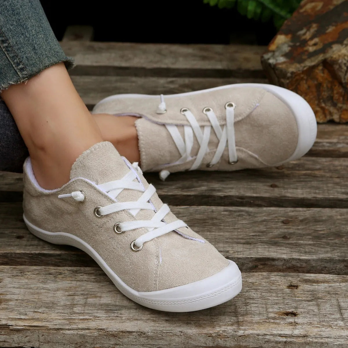 Women's creamy white fabric casual sneakers with rubber sole low top design