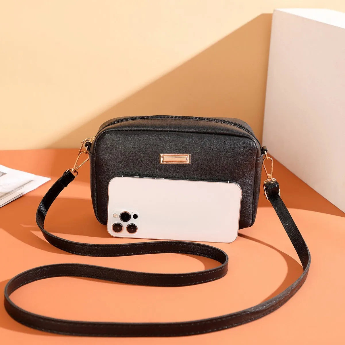 Women's solid colour PU shoulder bag with three-dimensional pocket in horizontal square design