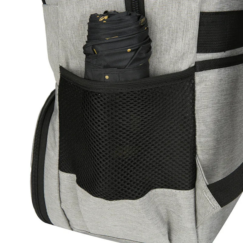 Insulated Oxford cloth backpack in light grey showing curved shoulder straps and dry-wet separation compartment