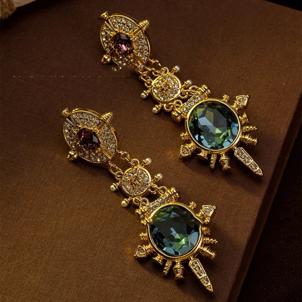 Gold geometric retro stud earrings with diamond treatment and drop design