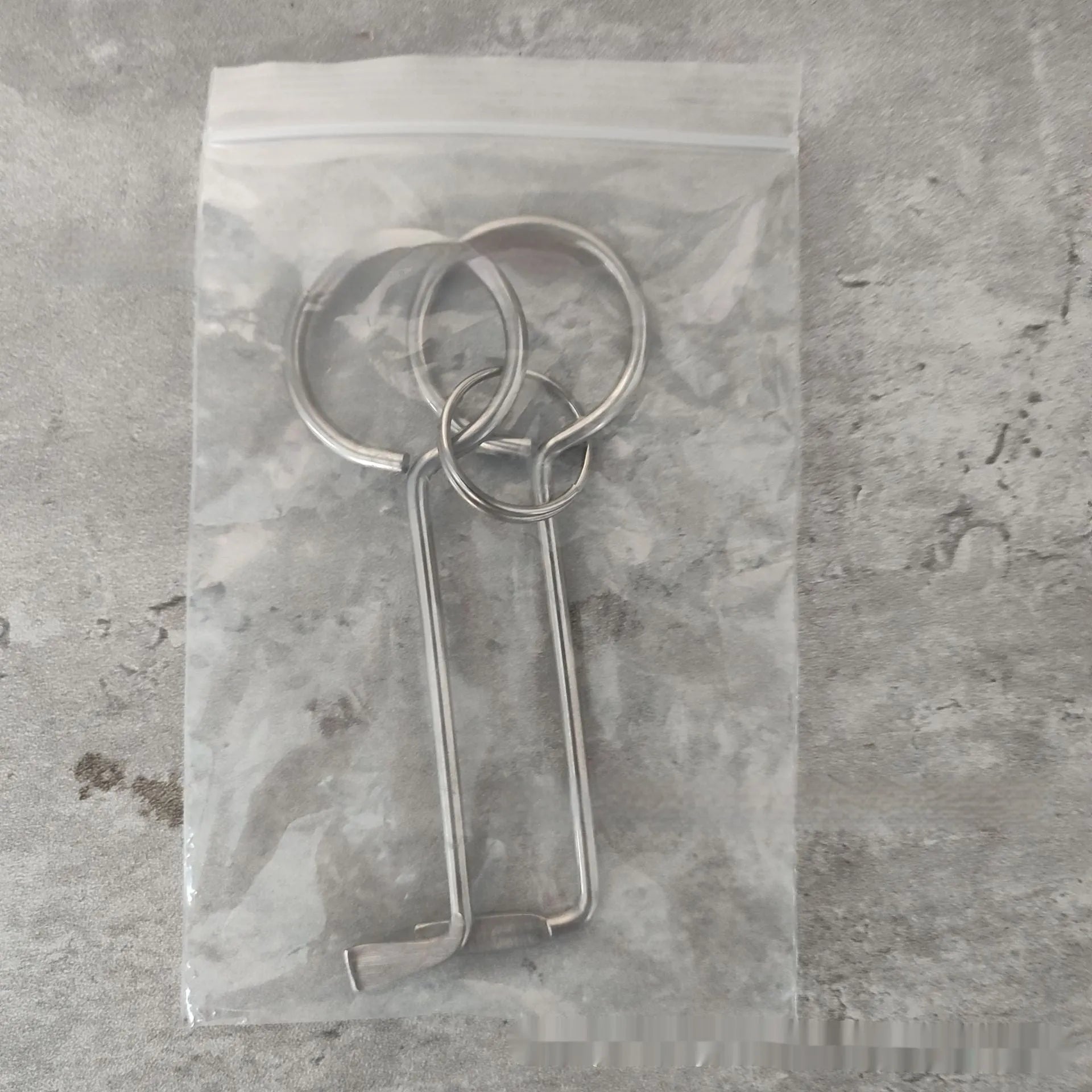 Two alloy wrench tools from a portable manual tool set for household repairs