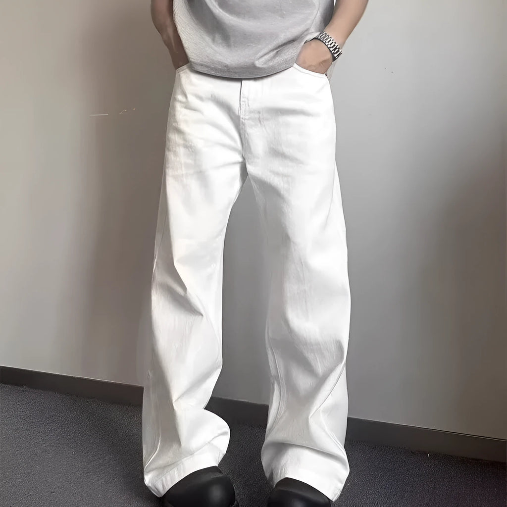 Men's straight-cut white wide-leg denim jeans with a mid waist and zipper fly