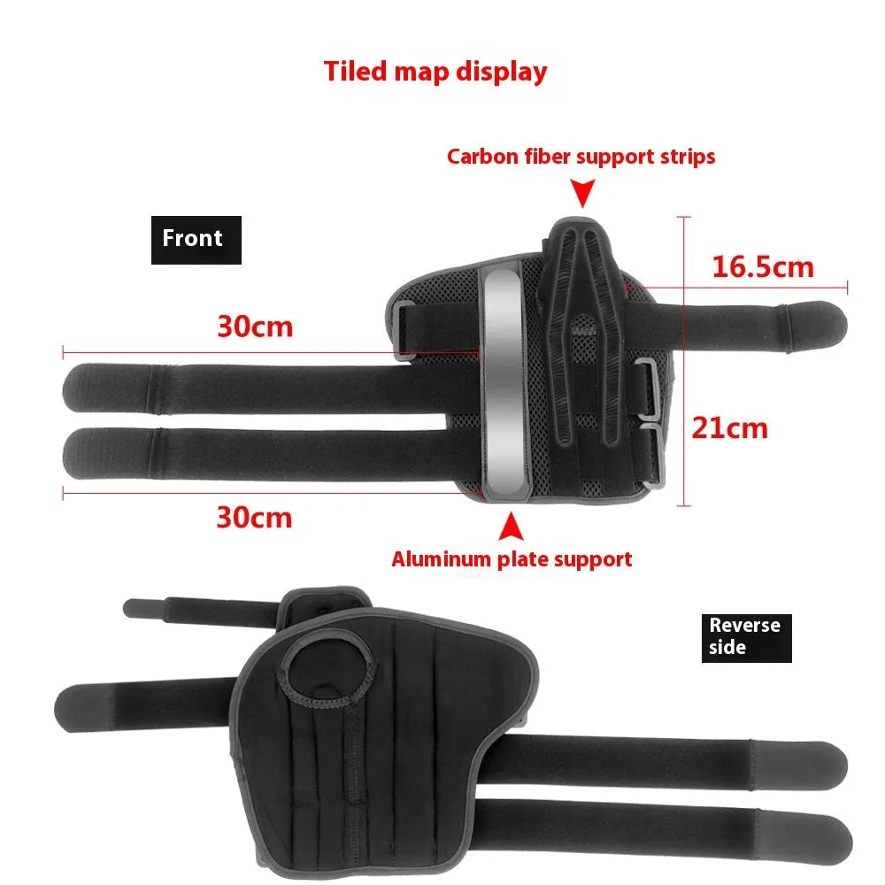 Black carbon fibre sports wrist guard with grey edging and adjustable thumb strap on athletic hand