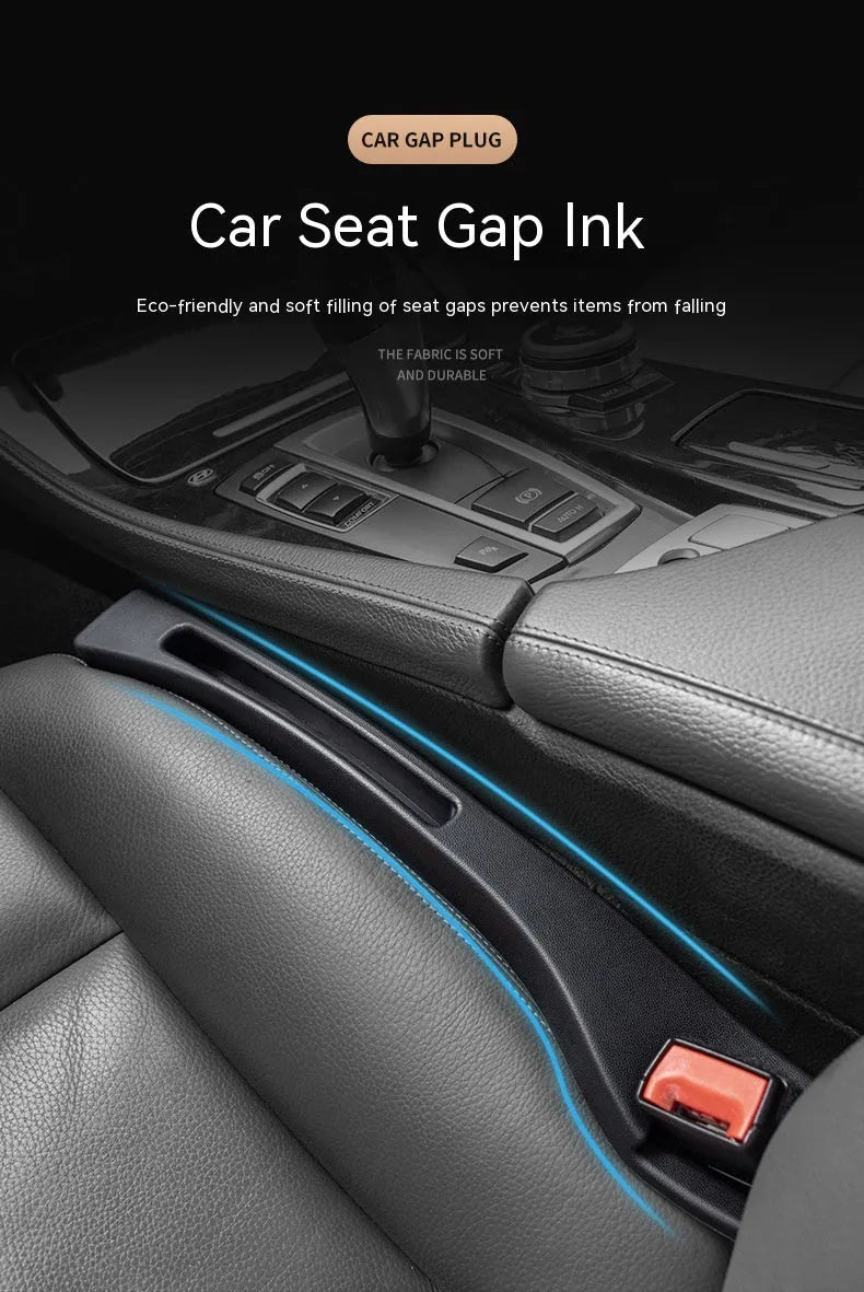 Black plastic car seat gap storage organiser box with a handle.
