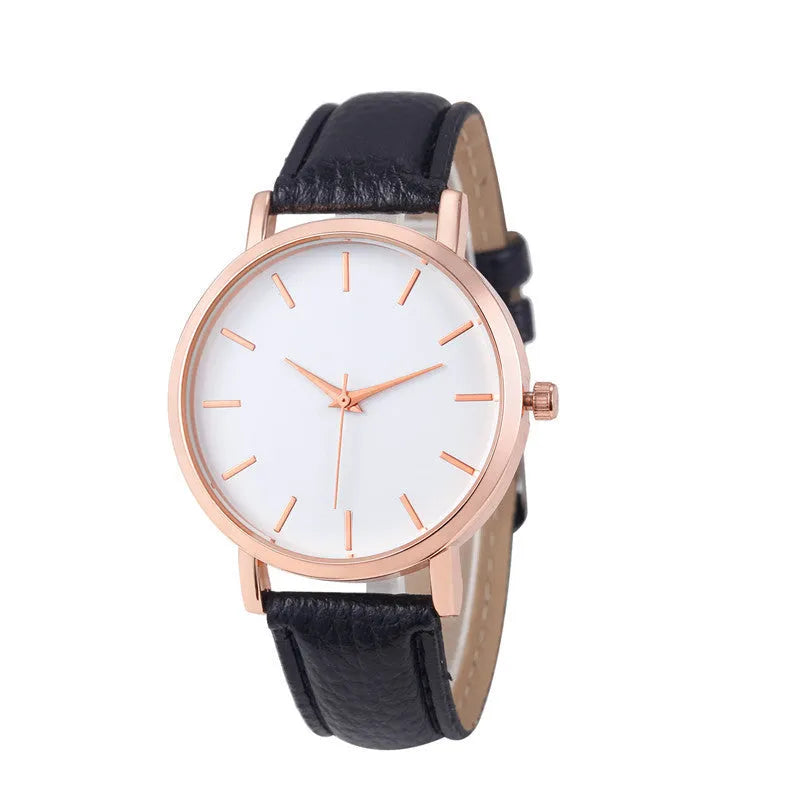 Square-faced quartz analogue watch with a PU leather strap on a wrist