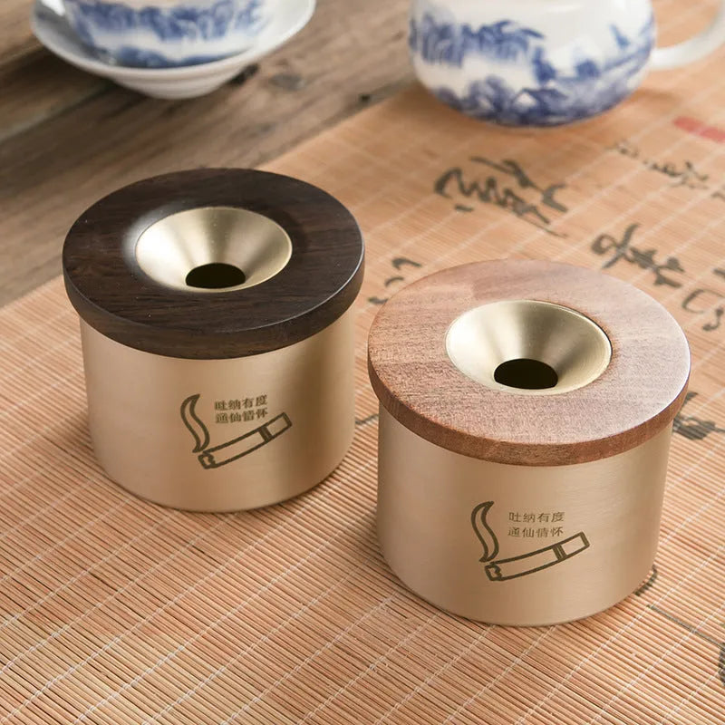 Brass retro ashtray with a wooden lid, available in black or rosewood finish.
