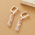 Rectangular hollow two-tone stud earrings with geometric pattern
