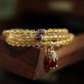Natural Brazil gold rutilated quartz bracelet with three rings and hanging chopsticks in Chinese style