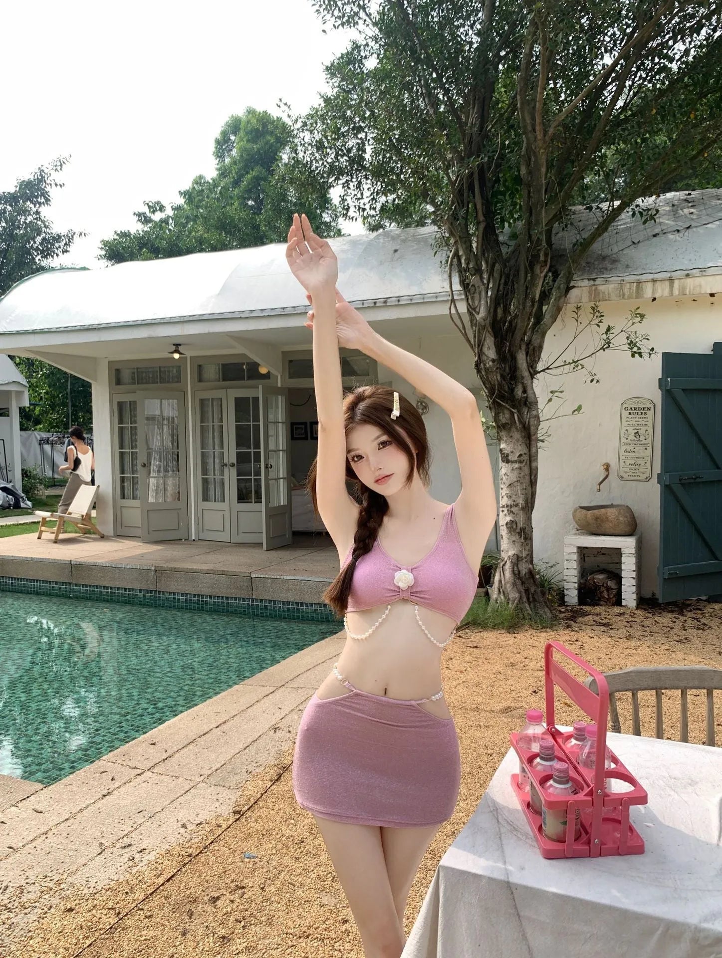 Women's pink and black three-piece polyester bikini set for swimming