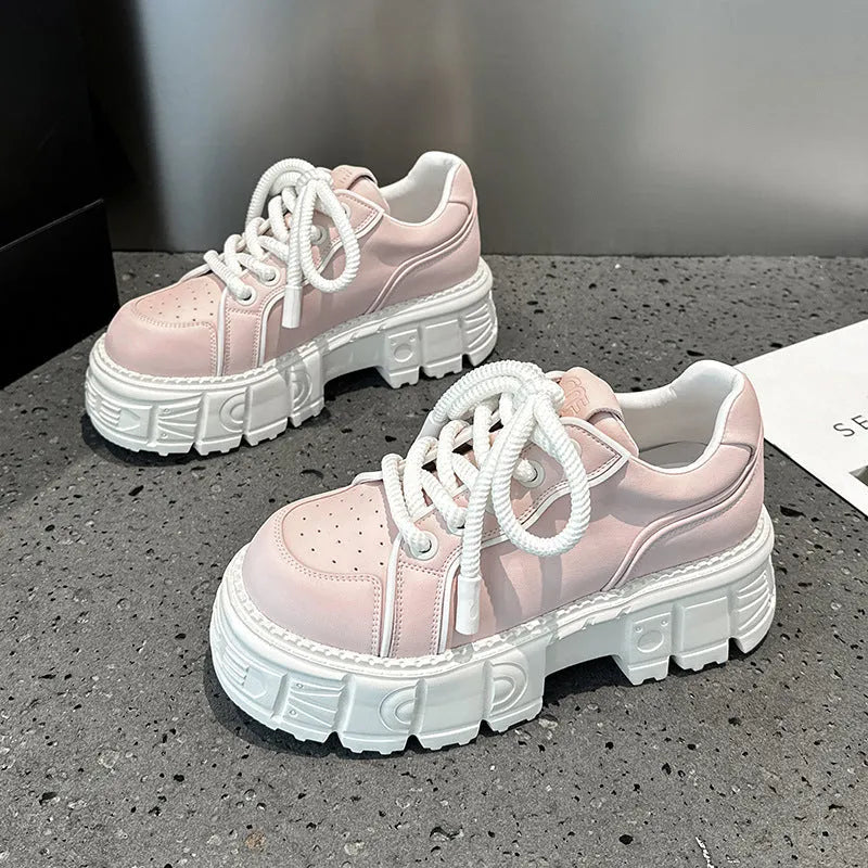 Women's beige leather casual shoes with viscose sole construction shown alongside pink version