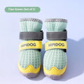 Pair of blue cartoon-style dog shoes made from PU material for summer paw protection.