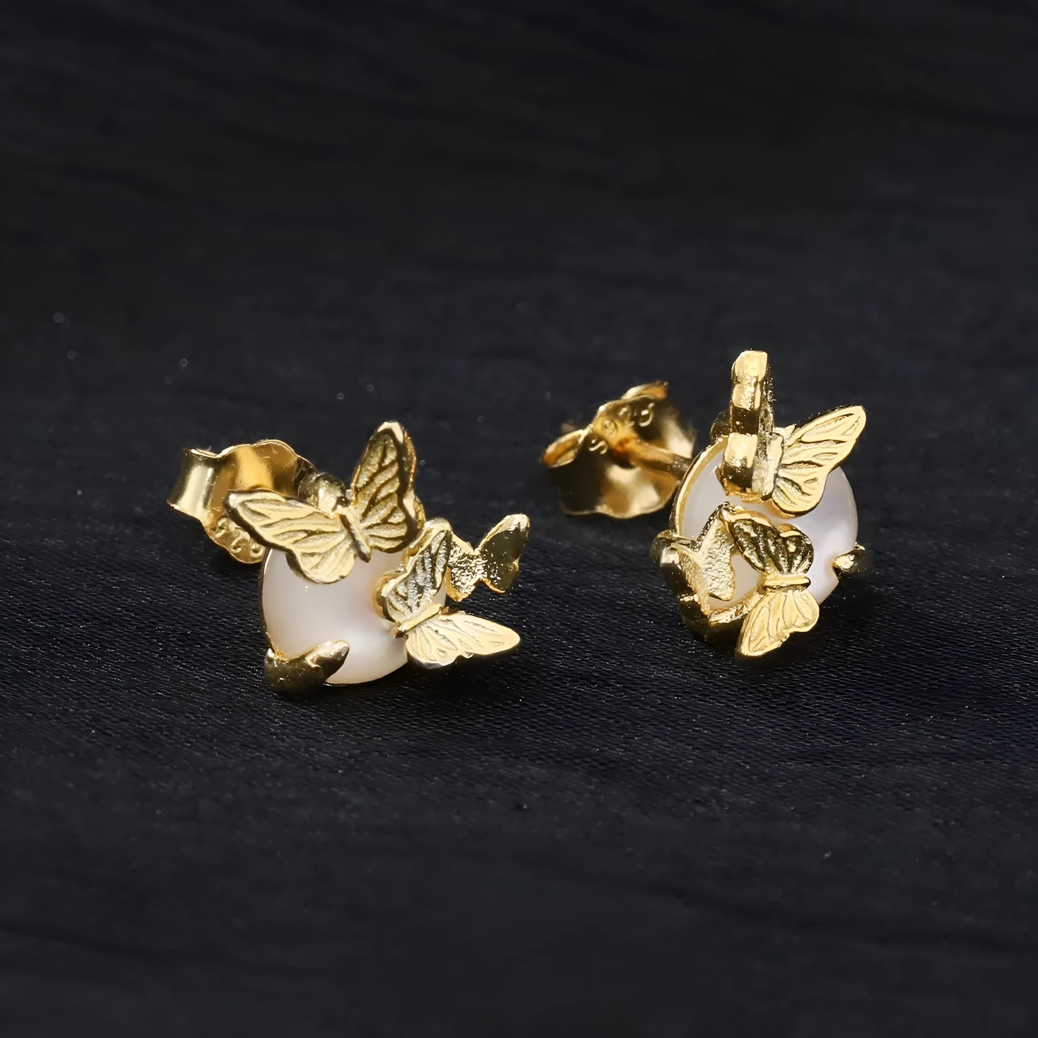 Butterfly design ear studs in 925 silver with white gold or gold electroplated finish