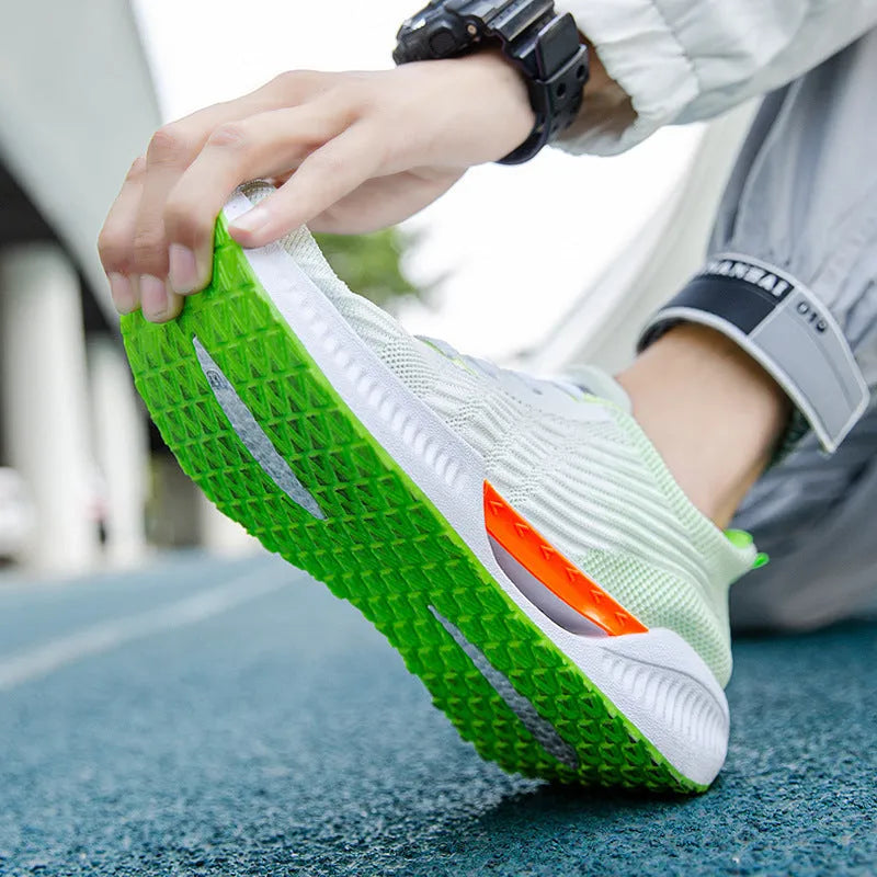 A pair of blue men's casual mesh sports shoes with a round toe and cloth upper.