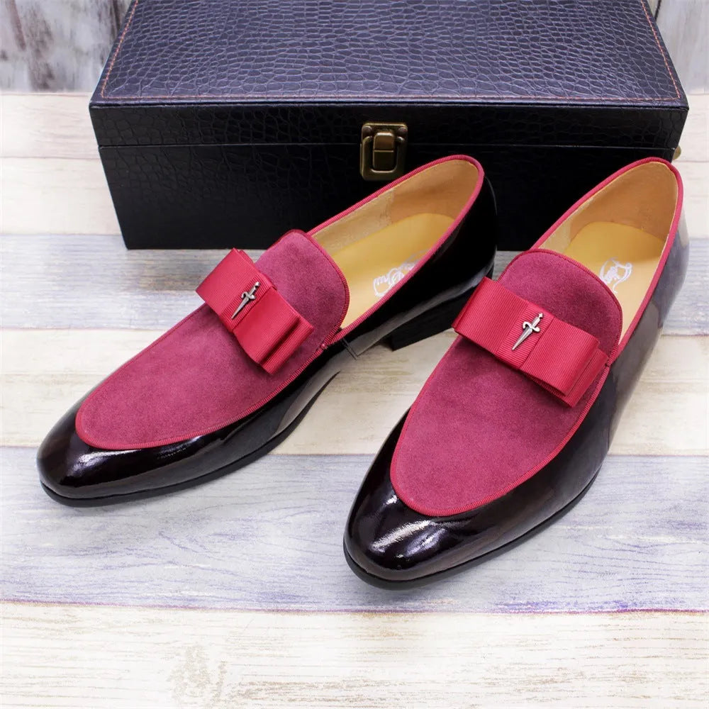 Men's low-top leather shoes in black with a tassel detail and glossy patent leather accents.