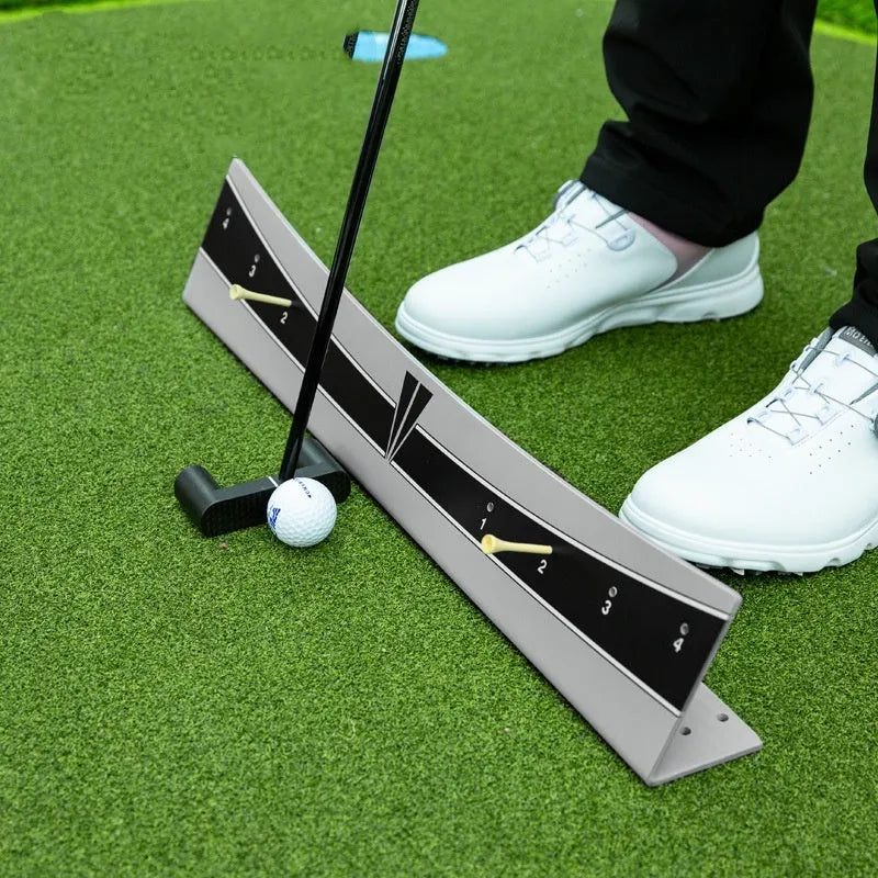 Adjustable golf putter balance simulator made of white PVC with a central training guide.
