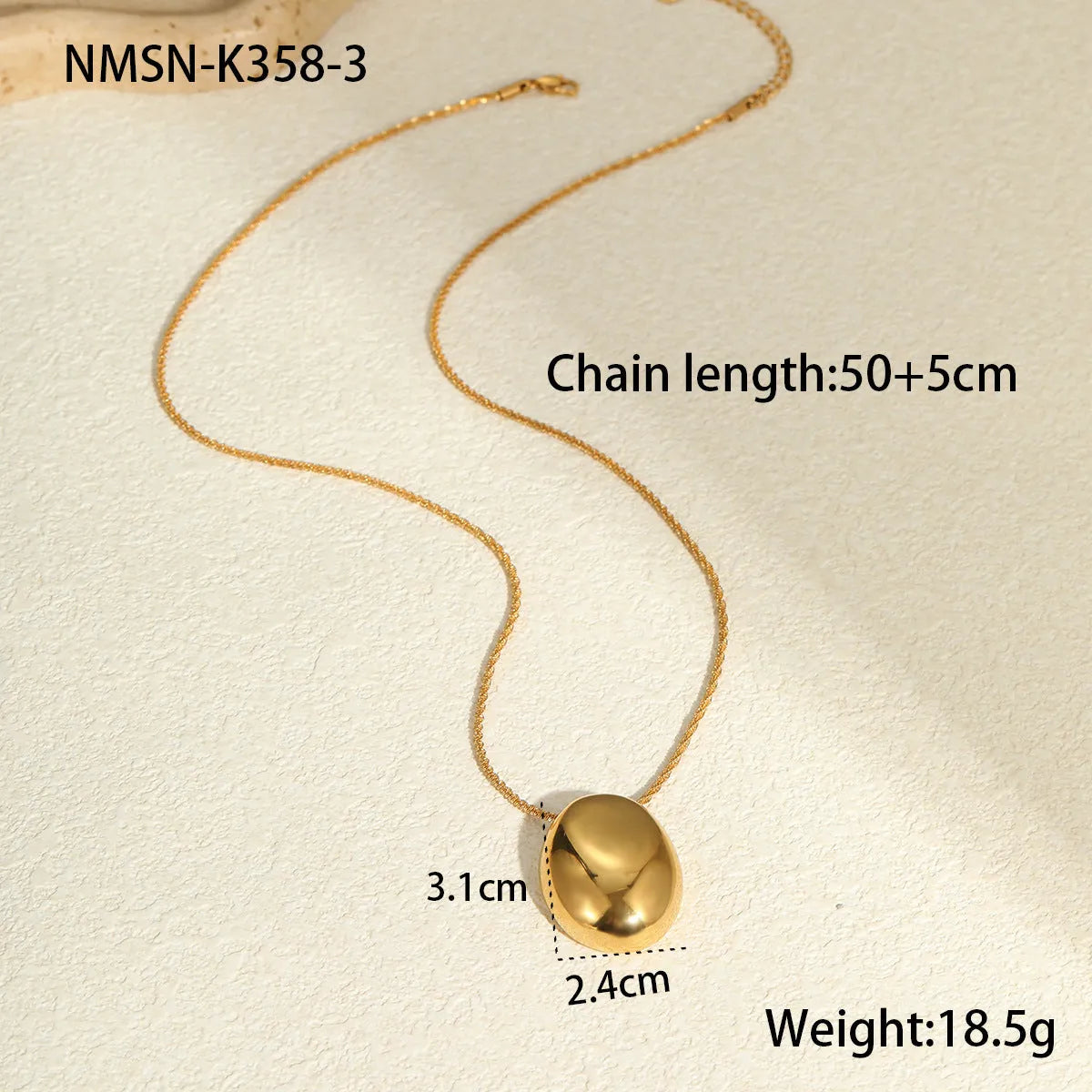 Geometric gold pendant on adjustable stainless steel chain necklace with regular links