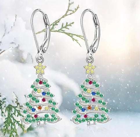 A pair of women's Christmas tree earrings with a star pendant shape in a white gold colour finish.