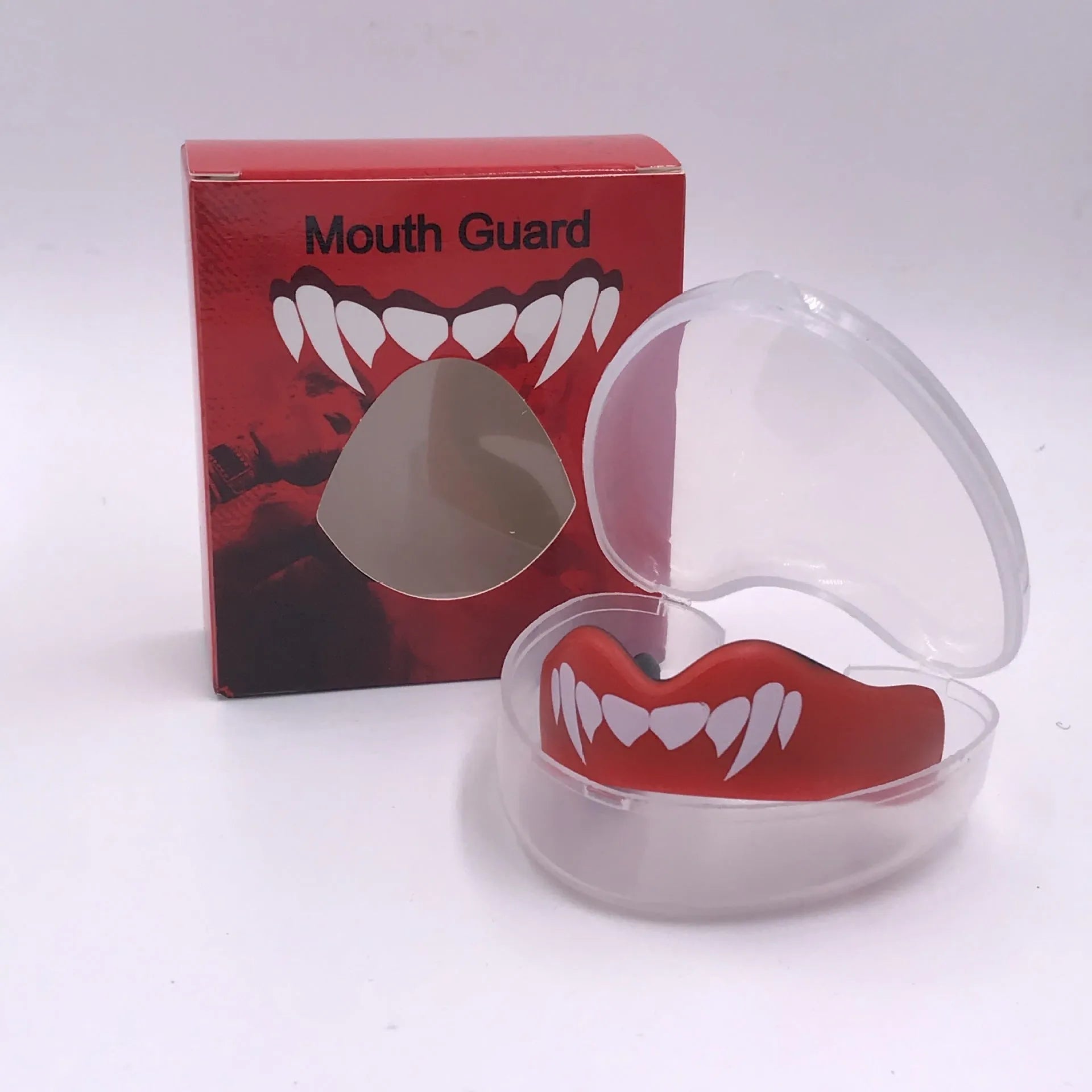 Adult boxing sports mouthguard with tooth socket free design in black and white printed teeth pattern.