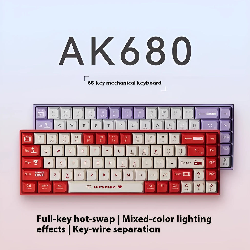 AJAZZ AK680 wired mechanical gaming keyboard with red and white mixed colour keycaps on a desktop.