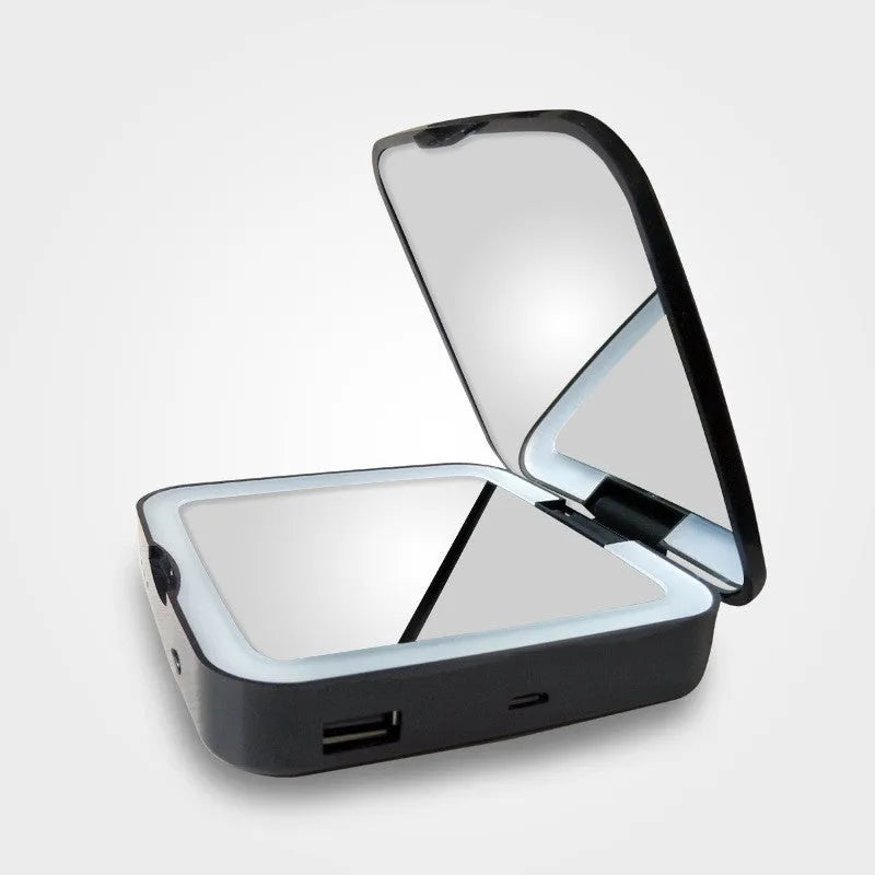 Black and white makeup mirror with 4x magnification on one side, HD mirror on the other, and adjustable lighting controls.