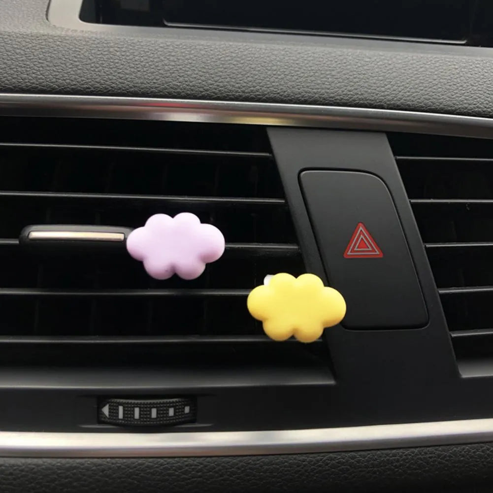 Baiyun cartoon resin car fragrance clip for air vents in assorted pastel colours.