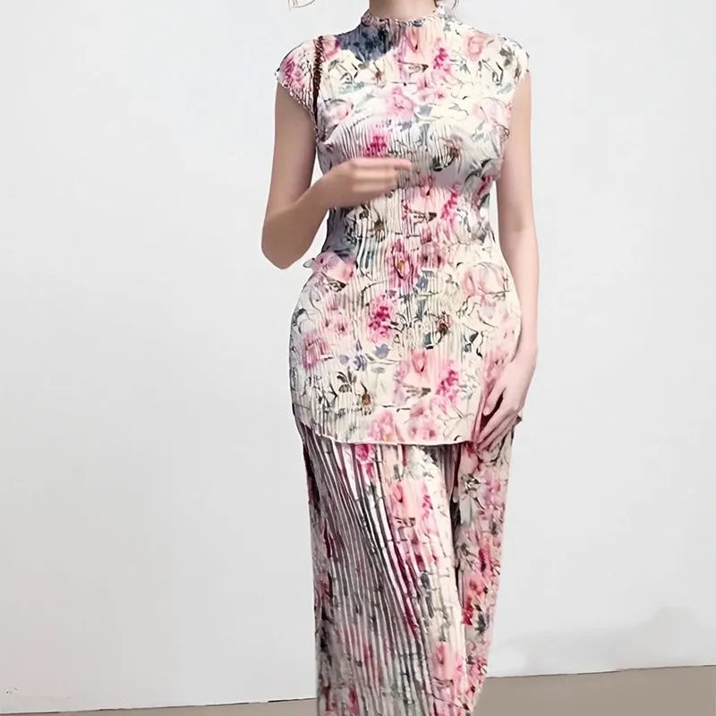 Long sleeve printed chiffon dress with high waist and matching top in a picture colour pattern.