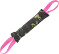 Beige jute dog tug toy with two fabric handles on a wooden floor