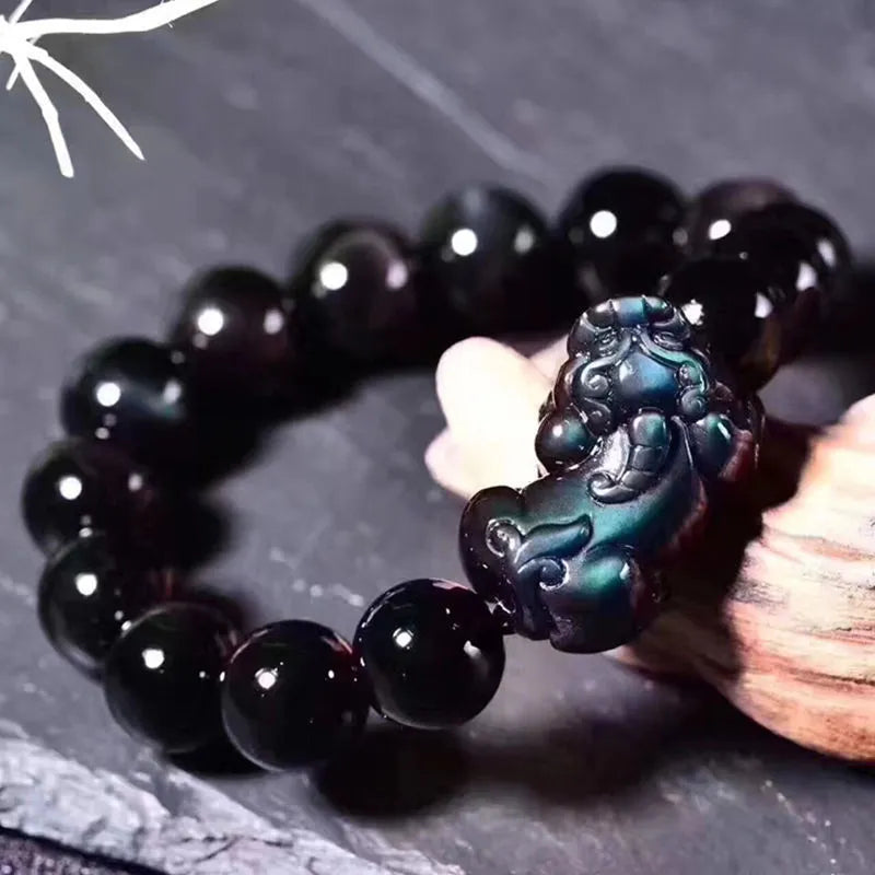 Natural ice colour eye obsidian crystal bracelet in unisex style with various bead sizes.