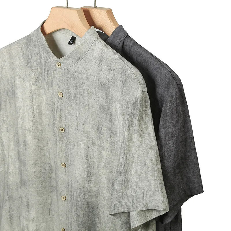 Men's loose grey cardigan shirt with stand collar and short sleeves on a hanger
