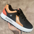 Men's casual shoes with round toe and artificial PU upper in white with orange, black or brown accents