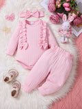 Pink baby girl three-piece set with ribbed frill long sleeve romper, pants, and matching headscarf on white background