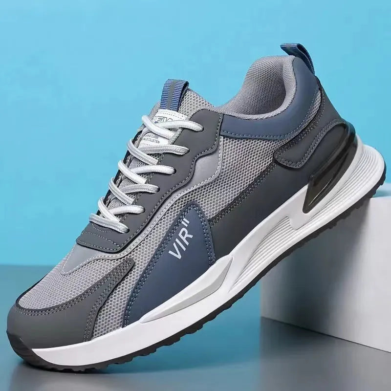 Men's colour block mesh sneakers in black, grey, or white with lace-up design and round toe.