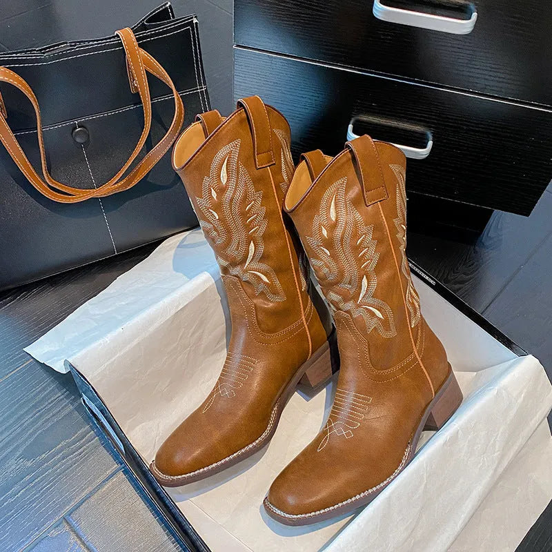 Brown embroidered women's mid-calf Martin boots with a waterproof platform and leather lining.