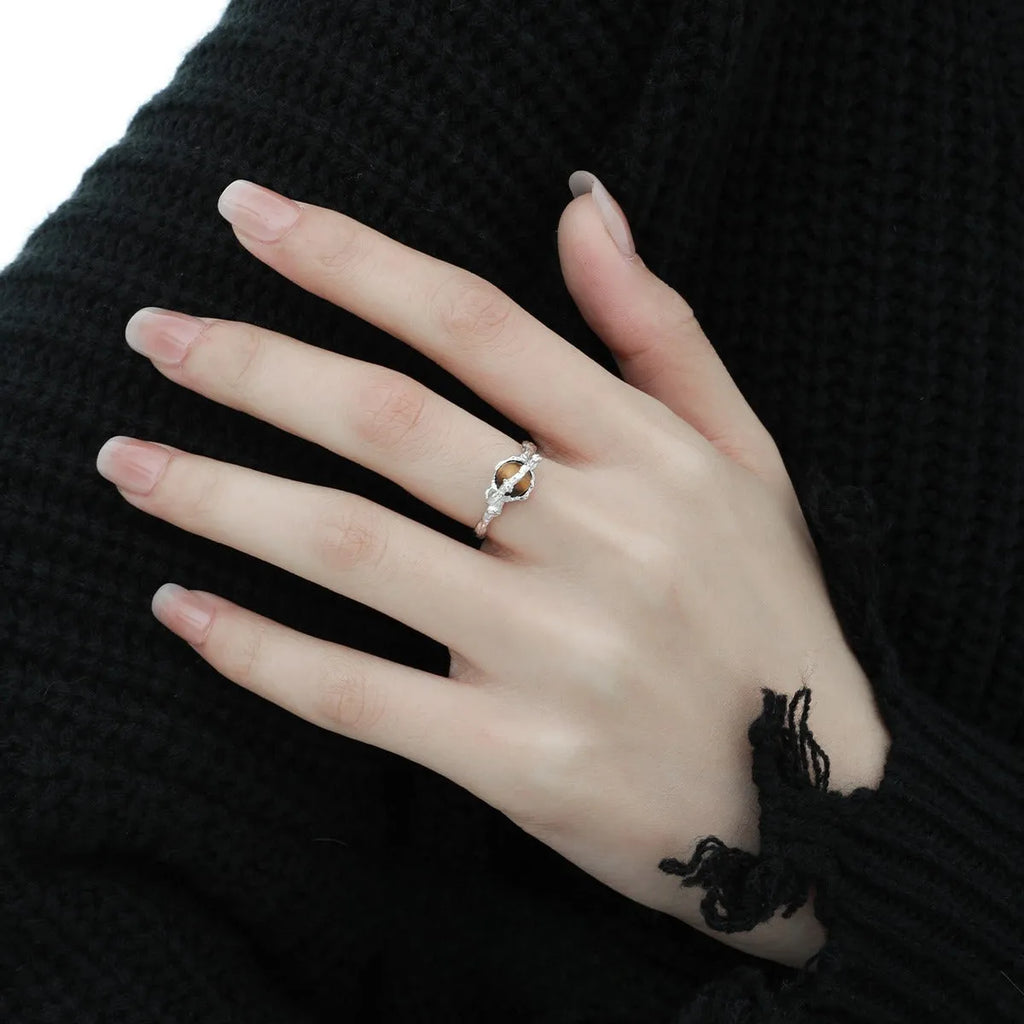 Silver Saturn design open ring with adjustable opening and white gold colour finish