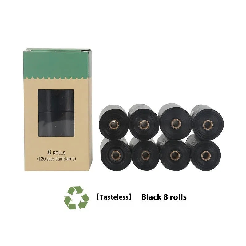 Roll of EPI degradable green dog poo bags next to a black portable dispenser on a green background.