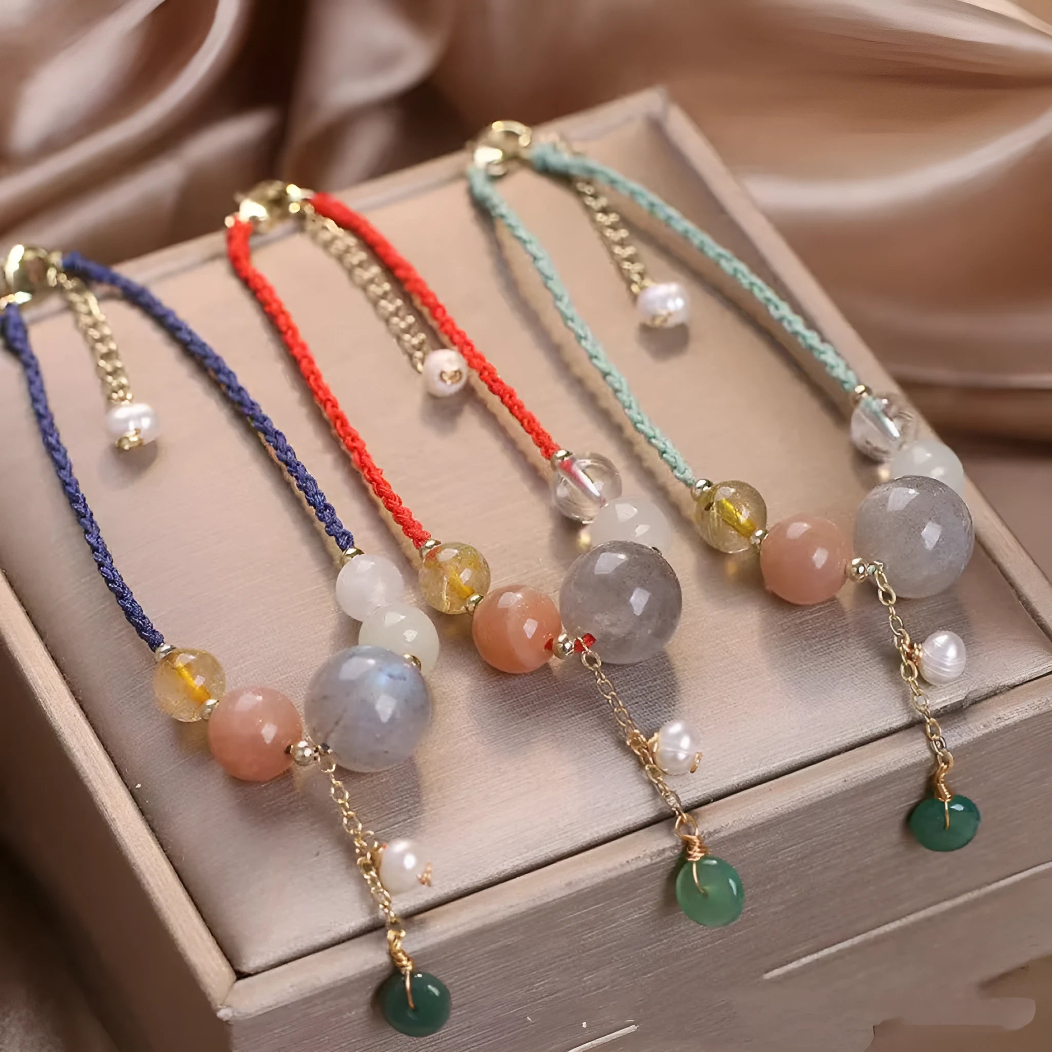 Hand-woven women's bracelet with peace buckle, crystal and sequin accents in red, green and blue colour options