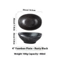 Oval Japanese ceramic sauce dipping bowl with hand-painted Edo pattern design on a table