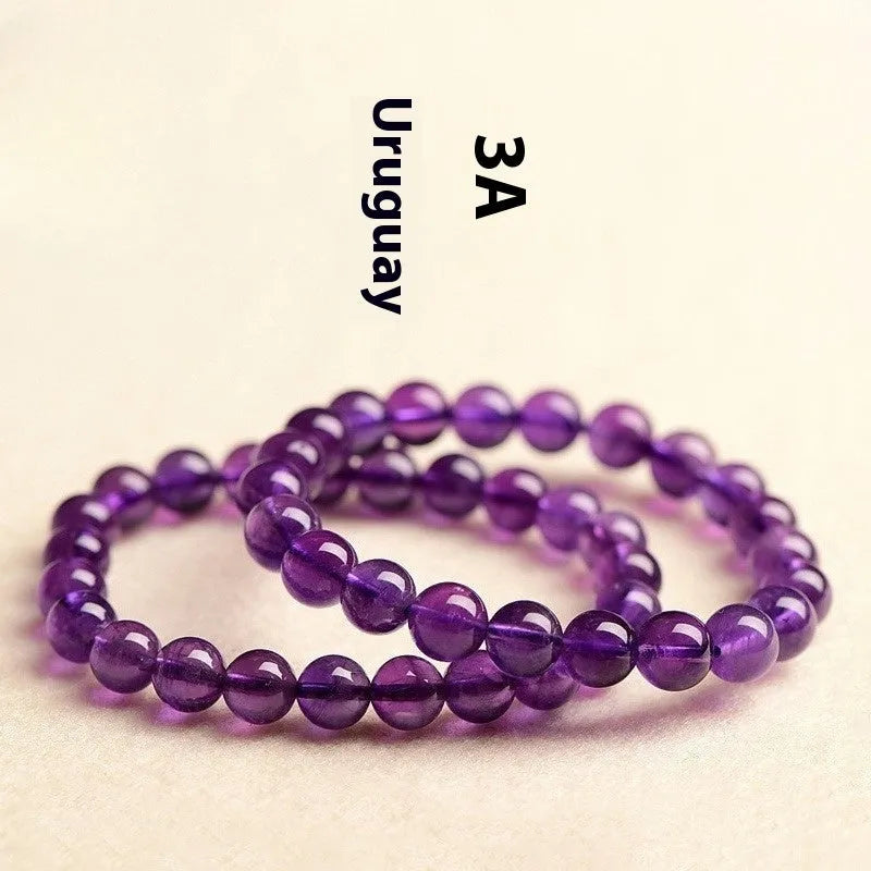 Natural amethyst scattered bead bracelet with polished crystal stones in lavender purple tones