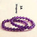 Natural amethyst scattered bead bracelet with polished crystal stones in lavender purple tones