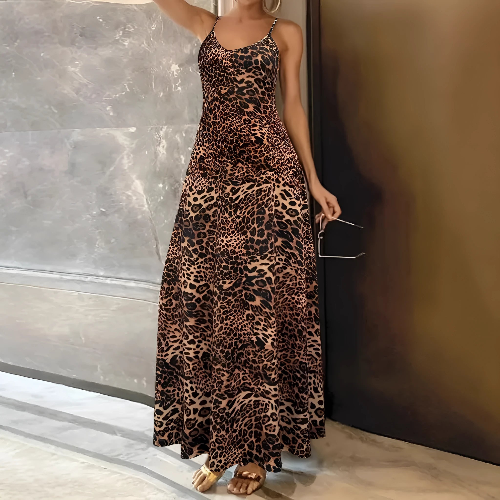 Dark brown leopard print sleeveless sling dress with round neck and shoulder strap, long hip skirt.