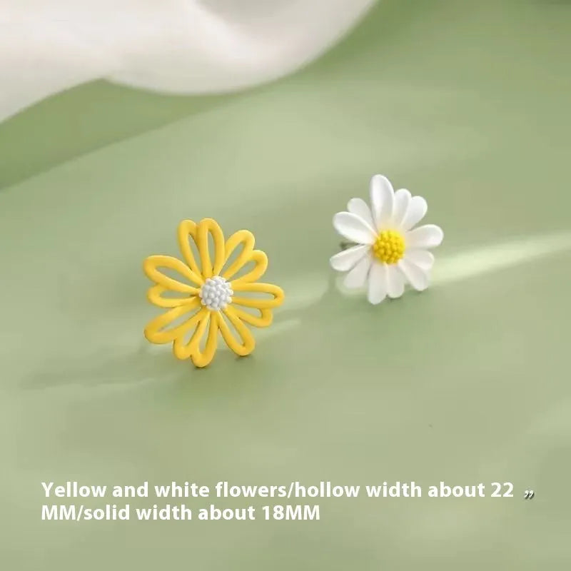 Cartoon flower stud earrings in blue and orange, white and green, or yellow and white alloy construction