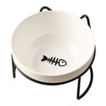 White ceramic cat bowl with cat paw print in a black iron frame stand with cat ears